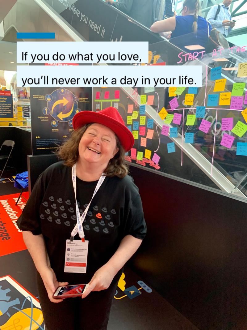 Donna Benjamin is laughing whilst at the Red Hat stand at Gartner IT Expo 2019