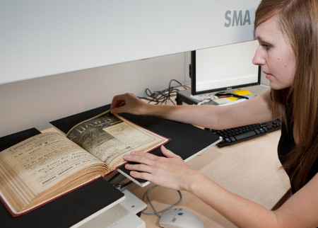 Page by page, the original journal was scanned by hand by staff at the National Library of Australia. Photo by Craig Mackenzie