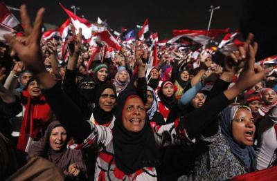 Photo by Mohamed Abd El Ghany - Women protestors in Tahrir Square, Egypt 2013.